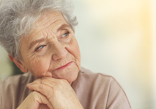 Senior woman wearing thoughtful expression