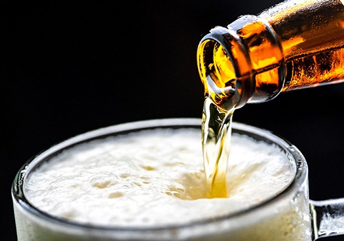 Beer being poured into glass