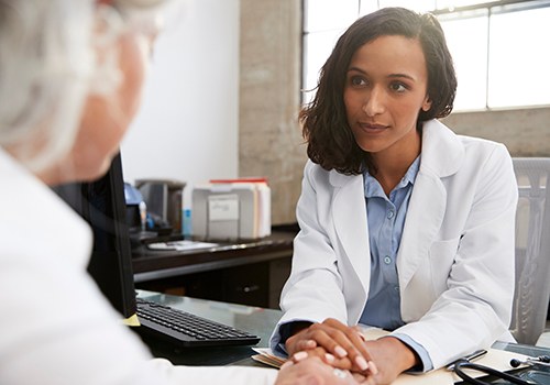 Woman speaking to a doctor